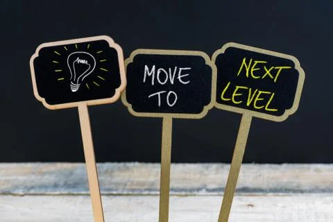 Concept message MOVE TO NEXT LEVEL Stock Photos
