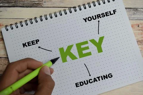 Concept of mind map KEY - Keep Educating Yourself write on book Stock Photos