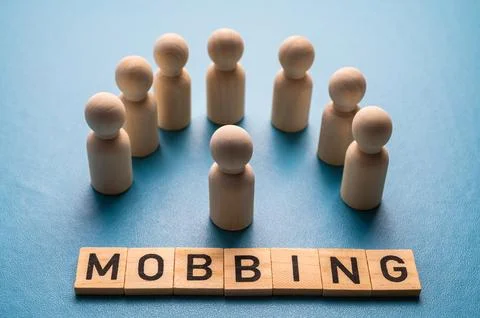 Concept of mobbing in the workplace. Stock Photos