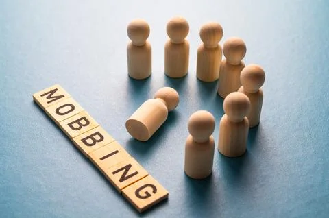 Concept of mobbing in the workplace. Stock Photos