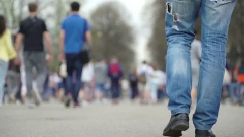 Concept modern holidays at weekends. Crowd walking in city park. Youth Video stock 76107529