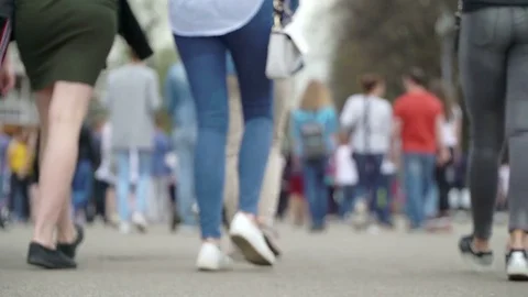 Concept modern holidays at weekends. Crowd walking in city park. Youth Stock Footage 76258807