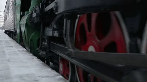 Concept Modern Life - Old and New. Steam Train Arrives at Station and Stops Stockbeeldmateriaal 69779136