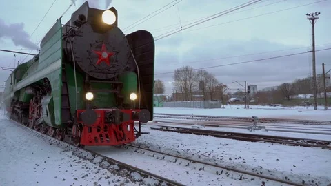 Concept Modern Life - Old and New. Steam Train Departs Railroad . Stock Footage 69779147