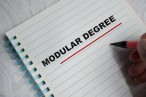 Concept of modular degree write on book isolated on Wooden Table. 写真素材