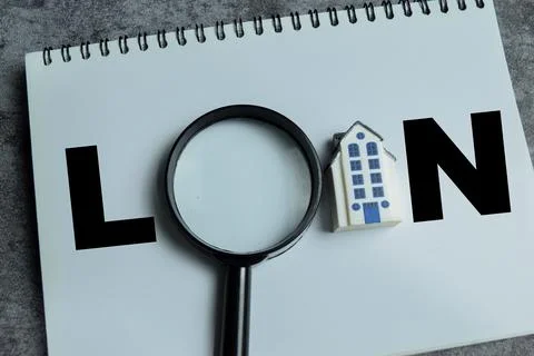 Concept of mortgage loan approval process and financial stress write on book Foto stock
