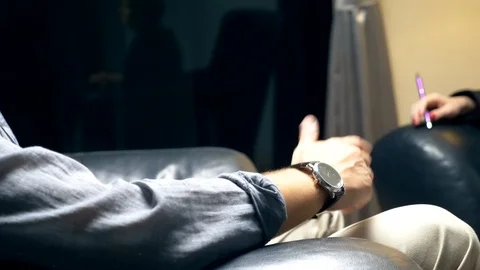 The concept of negotiation, successful people. a man in a black leather chair Stock Footage 105925624