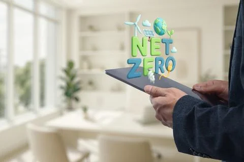 Concept of Net Zero with Tablets and Sustainable Elements in Room Foto stock