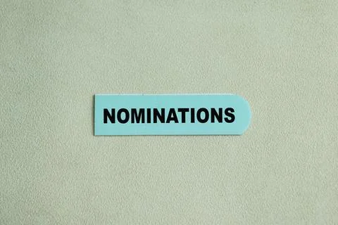 Concept of Nominations write on sticky notes isolated on Wooden Table. Foto stock