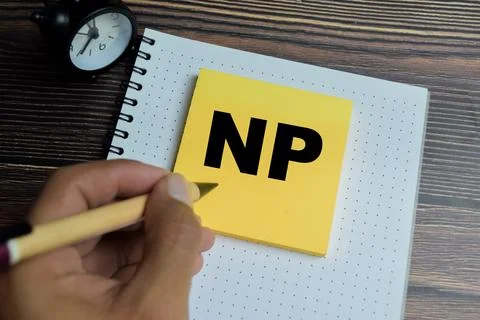 Concept of NP - No Problem write on sticky notes isolated on Wooden Table. 库存照片