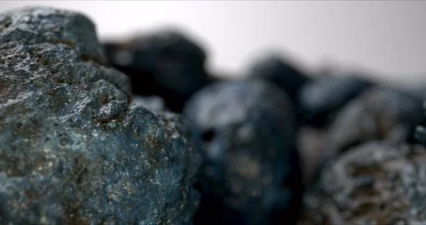The concept of objects of space origin, meteorite. Meteorites on white Stock Footage 147033716