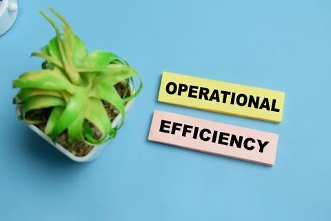 Concept of operational efficiency write on sticky notes isolated on table. Stock Photos
