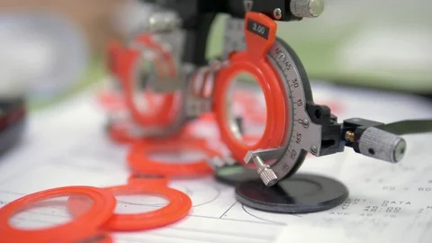 The concept of ophthalmology. A set of test lenses for checking visual acuity in Stock Footage 115212814