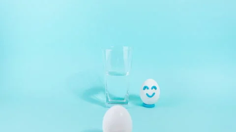 The concept of an optimistic and pessimistic outlook on life. Blue background. Stock Footage 232723170