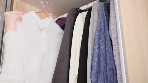 The concept of organizing space in the wardrobe. Stock Footage 149774476