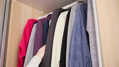 The concept of organizing space in the wardrobe. Stock Footage 149833883