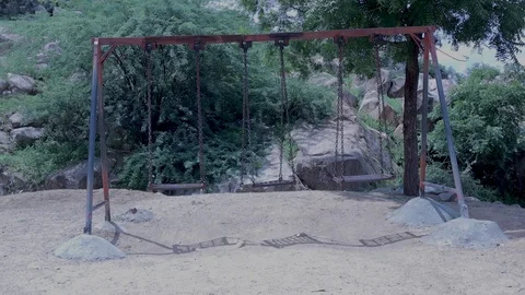 Concept of paranormal activity, video of one of the Swing swinging by 動画素材 117120816