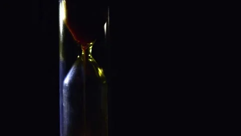 The concept of the passage of time in space, people's life is like a grain of Stock Footage 137603076