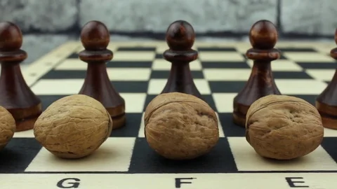 The concept with pawns and nuts Stock Footage 80362044