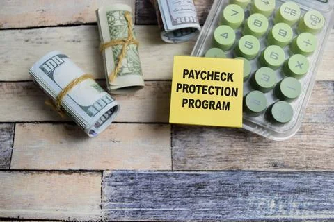 Concept of paycheck protection program write on sticky notes Fotos de archivo