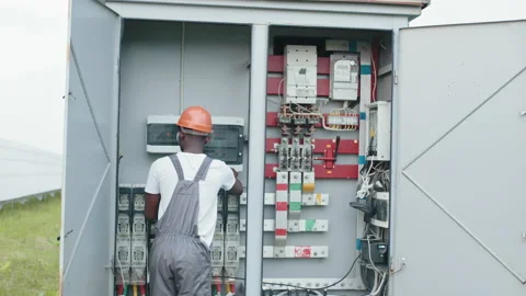 Concept of people, maintenance and alternative energy. Electrical Systems Stock Footage 168913616