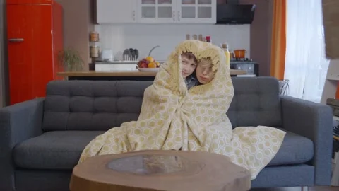 The concept of people trying to keep warm in the cold. Slow motion video. Video stock 148945485