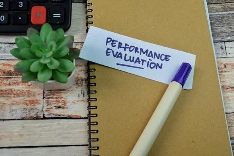 Concept of Performance Evaluation write on sticky notes Stock Photos
