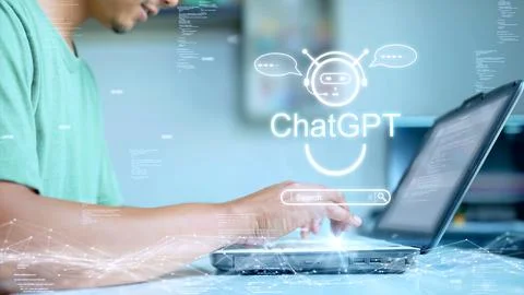 The concept of a person using a computer to connect to ChatGPT technology t.. 스톡 사진