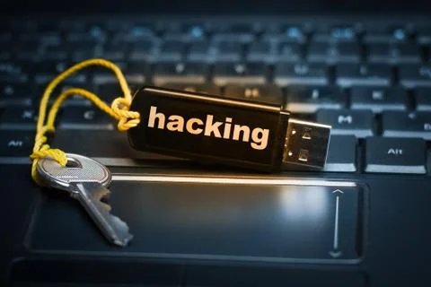 The concept of personal data cybersecurity. Flash drive labeled hacking. Toni 스톡 사진