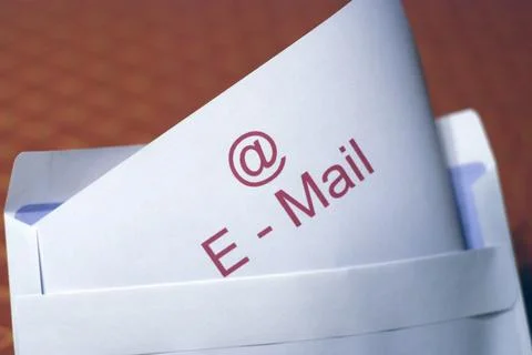 Concept photo of an envelope with e-mail characters Stock Photos