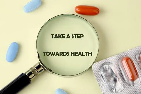 The concept phrase is TAKE A STEP TOWARDS HEALTH. Family values concept. lose up Stock Photos