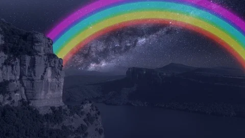 Concept piece dreaming of rainbows under stars at night Stock Footage 105584131