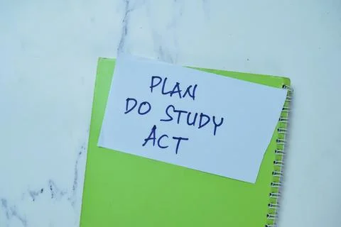 Concept of Plan Do Study Act write on sticky notes isolated on Wooden Table. 스톡 사진