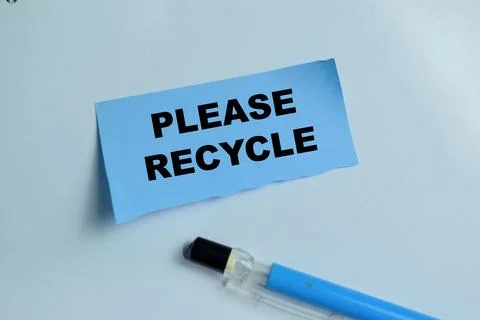 Concept of please recycle write on sticky notes isolated on Wooden Table. Stock Photos