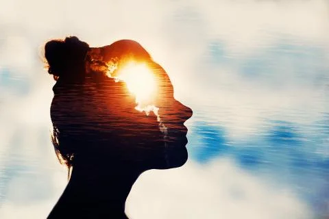 The concept of the power of knowledge. Silhouette of smart girl. 写真素材