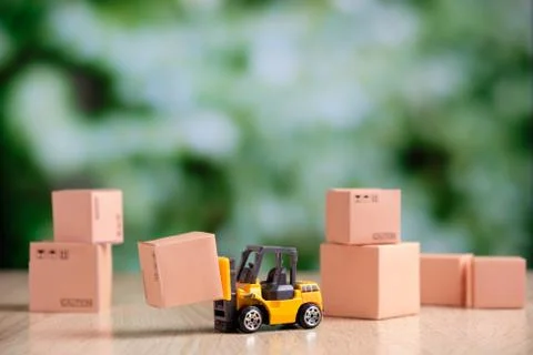 The concept of preparing cargo for shipment using a forklift Stock Photos