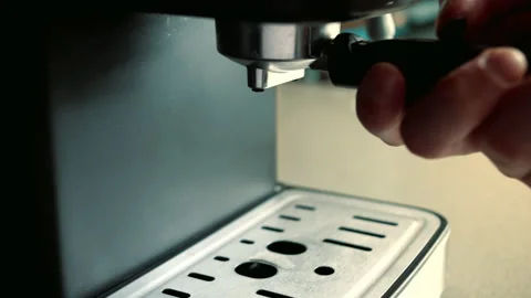 Concept preparing roasted black coffee in morning.Barista inserts tray ground Stock Footage 201379428