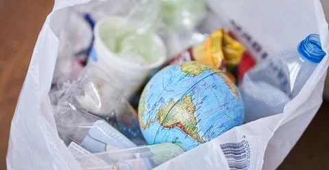 The concept of the problem of ecology and World Environment Day. Globe of the Stock Photos