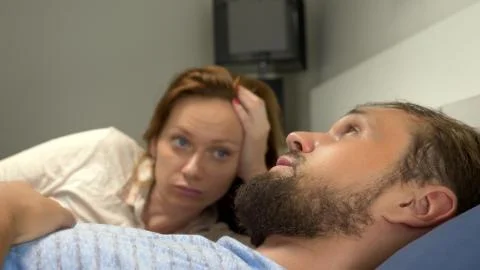 The concept of a problem in a pair. sexual problems. couple in bed. the woman Fotos Stock