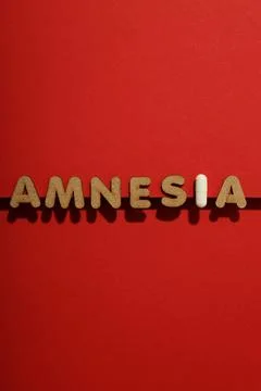 Concept of problems with memory, amnesia disease on red background Stock Photos