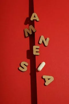 Concept of problems with memory, amnesia disease on red background 스톡 사진