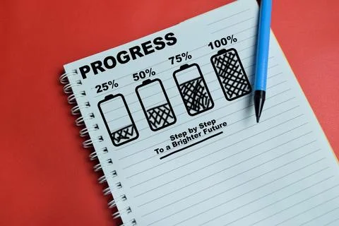 Concept of progress loading battery icon step by step write on book Stock Photos