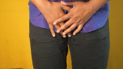 The concept of prostate and bladder problem, crotch pain of a young person Video stock 273437130