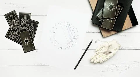 Concept of psychic advisor or ways of divination with cards. Stock Photos