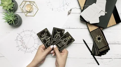 Concept of psychic advisor or ways of divination with cards. Stock Photos