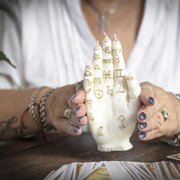 Concept of psychic advisor or ways of divination with cards. Stock Photos
