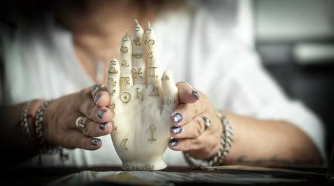 Concept of psychic advisor or ways of divination with cards. Stock Photos
