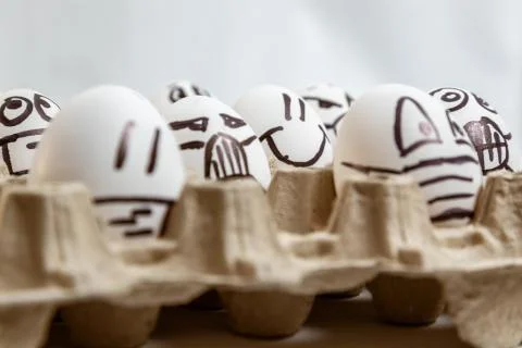 Concept of quarantine easter. close up of set of Easter smiled egg surrounded Stock Photos