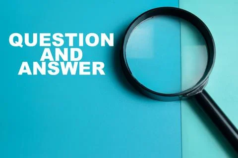 Concept of question and answer write on color background with magnifying glass Stock Photos