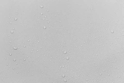 The concept of raindrops falling on a gray background Abstract wet white su.. Stock Illustration